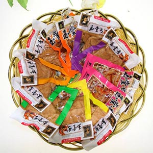 散裝稱重豆干是怎么實現(xiàn)全自動真空包裝的？