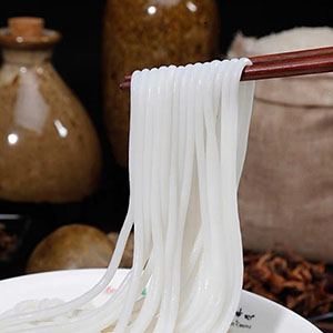 鮮米粉全自動給袋式真空包裝機的工作原理是怎樣的？