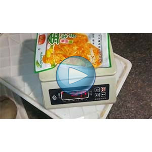 金針菇給袋式真空包裝機，35包/分鐘，自動計量、自動抽真空封口